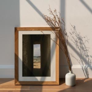Dried white statice flower in a white vase by a wooden frame  mockup